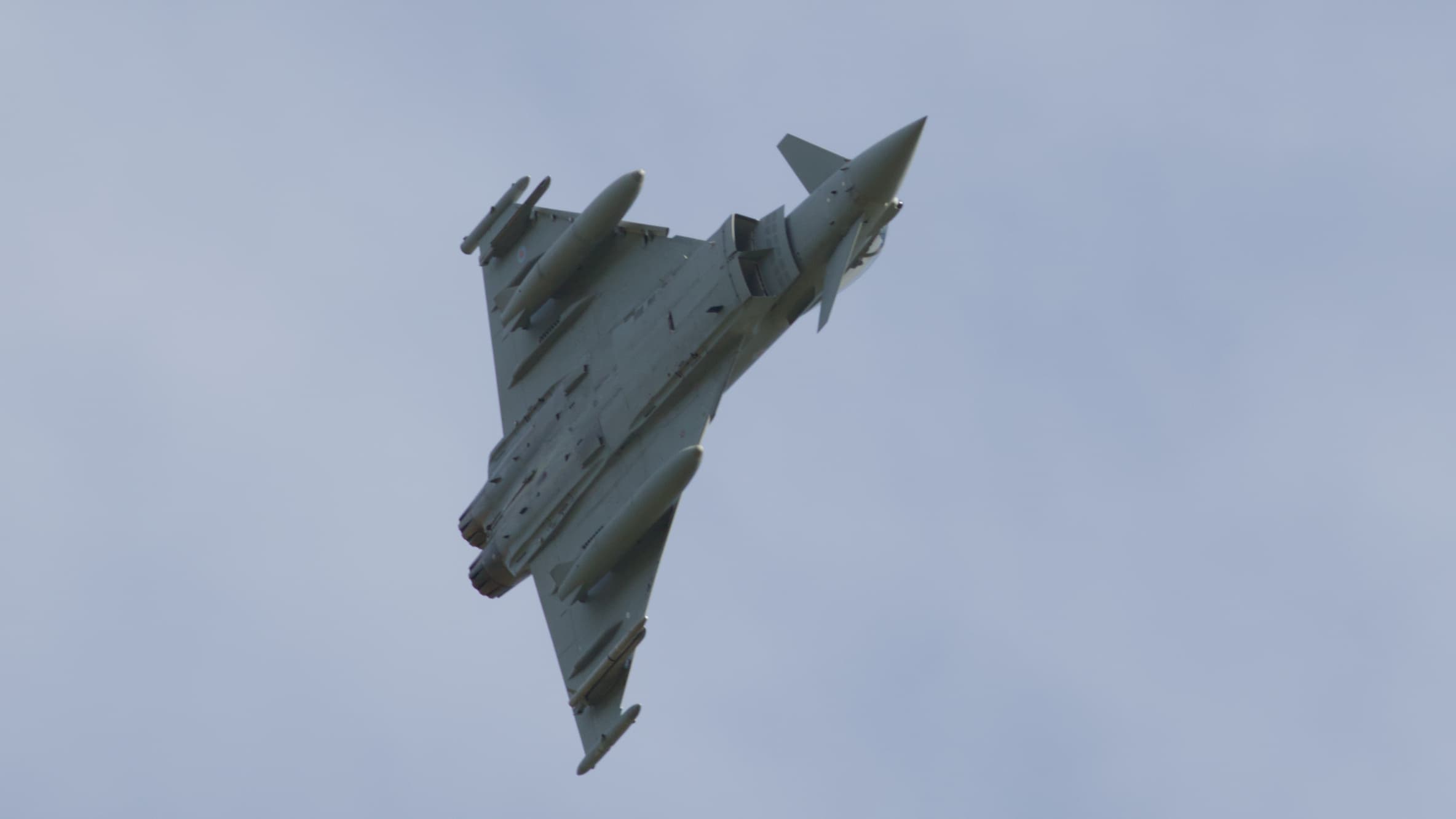 RAF Typhoon climbing steeply after departure from RAF Lossiemouth